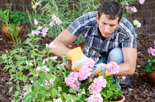 Gardener using protective equipment during outdoor task